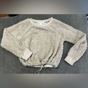 Planet gold sweater size small in Junior